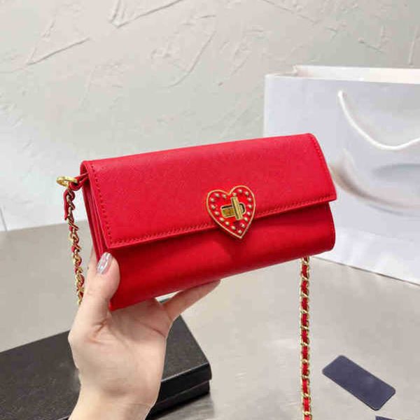 

evening bags love envelope bags gold chain one shoulder luxurys designers cute coin purse handbag tote wallets cross body 220818