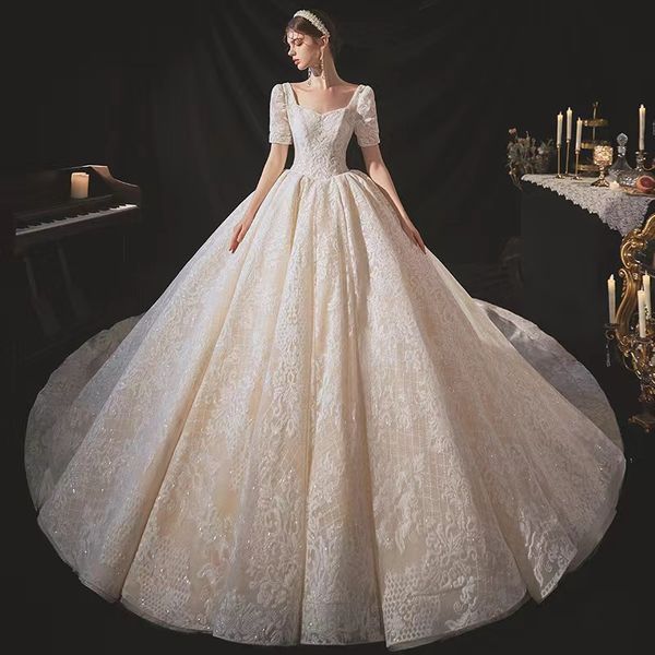 

2023 lace a line wedding dresses embroider elegant neck long sleeves beaded overskirt dubai arabic sweep train vintage bridal gowns, White