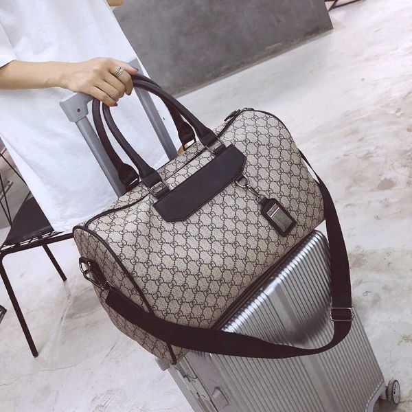 

design bag factory wholesale and retail short distance travel women's portable korean version large capacity luggage light simple men&#