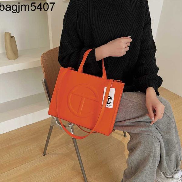 

design bag factory wholesale and retail women's 2023 new simple large capacity hand bag fashionable candy color single shoulder msenger