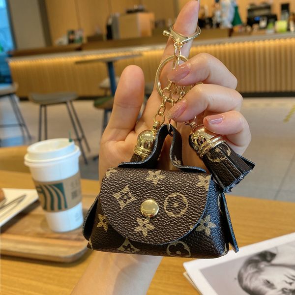 

party favor creative old flower leather key chain tassel zero wallet portable mini storage headset small bag pendant wholesale