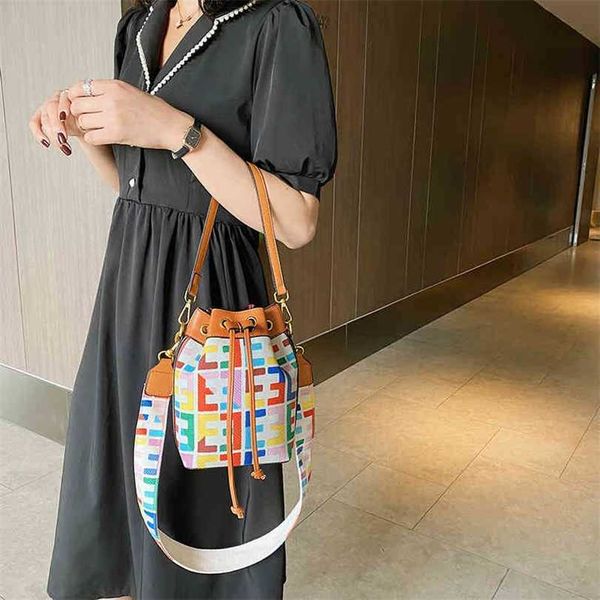 

70% off 2023 designer bag net red small female korean simple letter large capacity wide strap messenger bucket