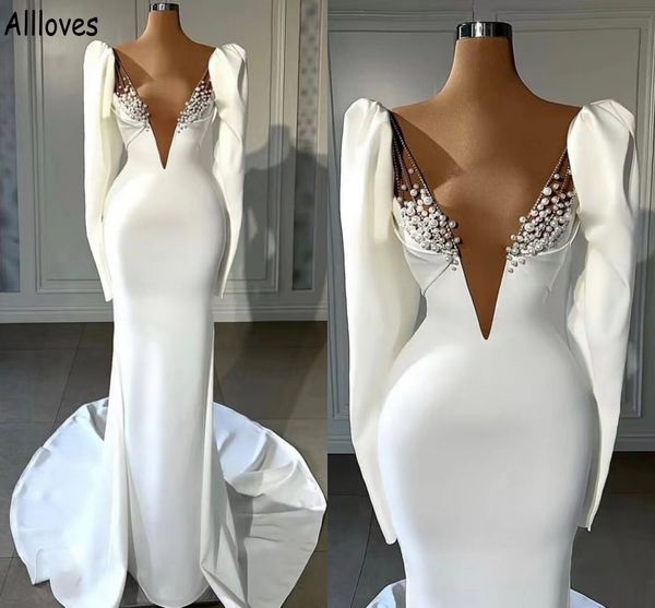 

plunging v neck mermaid wedding dresses gorgeous pearls long sleeves dubai arabic bridal gowns with train vintage boho elegant satin robes d, White