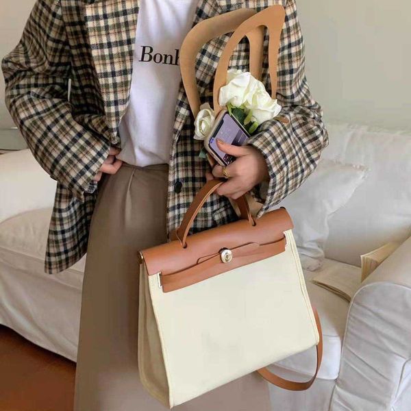 

designer fashion herbag herme of parody 2022 new canvas advanced feeling bill lading shoulder diagonal straddle women's