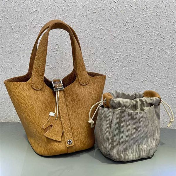 

designer herme bag women's large fashion classic 2022 new togo layer kraft vegetable basket 14cm small hand