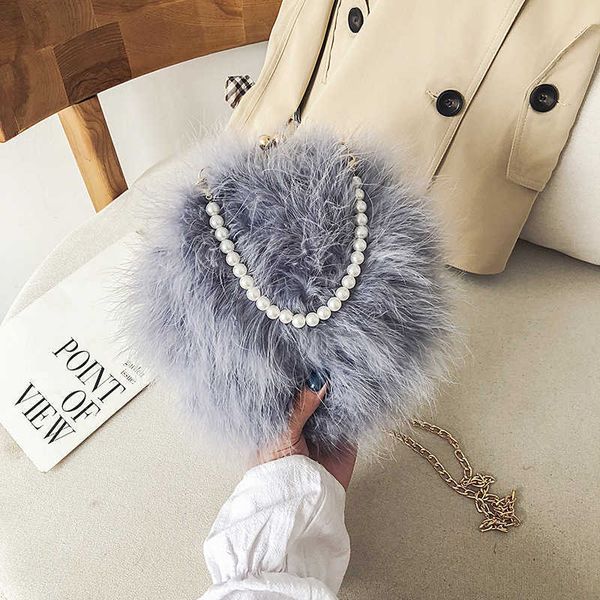 

clutch bags purse fur bag turkey feather bag female pearl portable one shoulder oblique cross chain dinner small round bag 220920