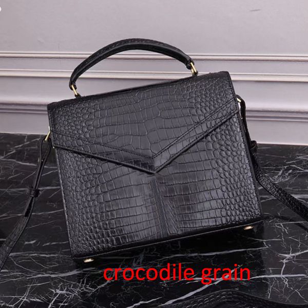 

cassandra handle bag in grain de poudre embossed leather designer flap pivoting closure handbag metal hardware totes luxury shoulder bag pur