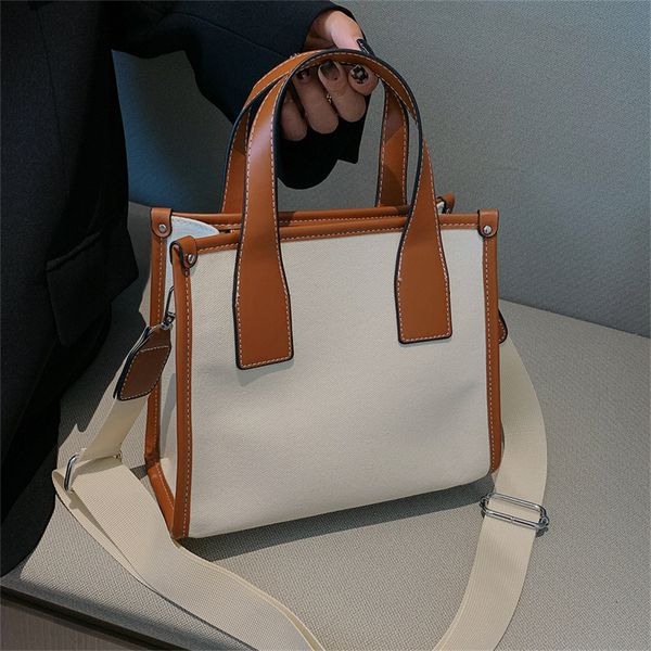 

designer casual women's canvas shoulder bags solid color handbags 2022 new korean simple female crossbody bag fashion portable small to, Black;red