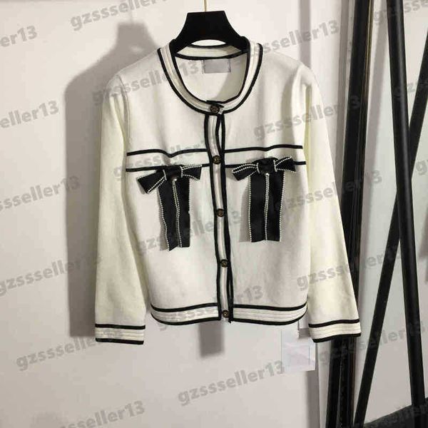 

cardigan women sweaters cnl pearl bow embellished crew neck knit cardigans fashion brand stripe decoration knit designers womens clothing 0, White;black