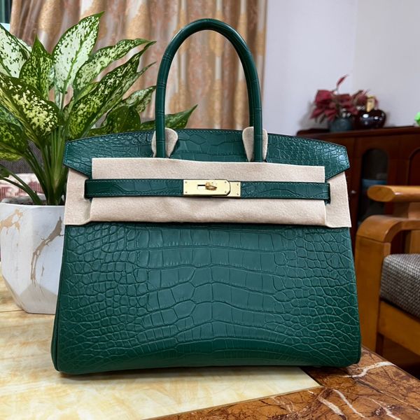 

customized bag by senior designer real american alligator skin hand made honey wax thread stitch gold and silver hardware 30cm