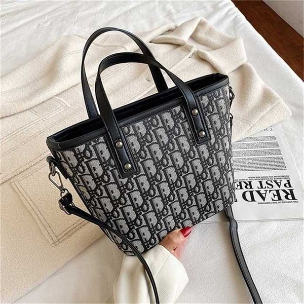 

60% off 2023 designer bag women's small hand messenger wind letter printing woven vegetable basket leather surface shaping bucket moist