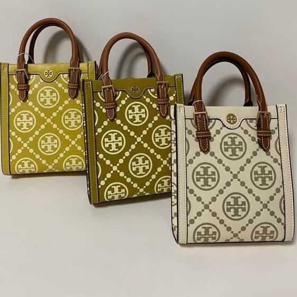 

messenger bags luxury torysburchs designer fashion shoulder handbags embossed mini tote bag and refined leather music score bag