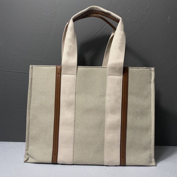 

lady's handbag tote luxurys designers bags delicate calfskin and cotton canvas clever stitching fashion woody shopping bag 2022