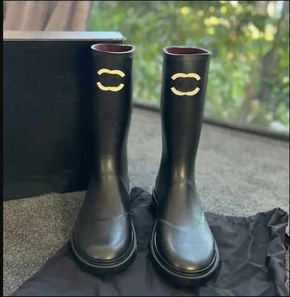 

woman's boots rain boots designer fashion black autumn print outsole slim leg