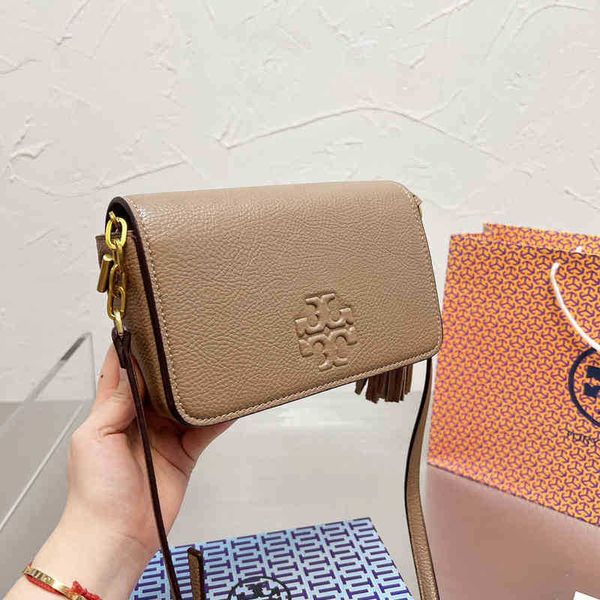 

designer torys shoulder female handbags tassel women's bag camera one messenger versatile high-grade foreign style leather small square