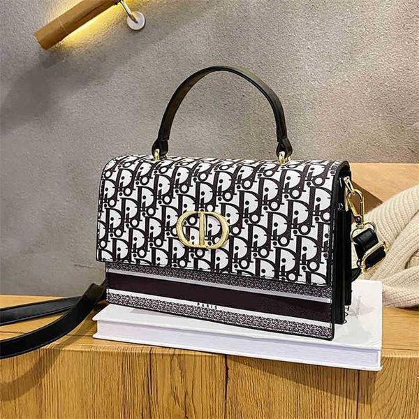 

30% off 2023 designer bag odny women's color spray painting letter printing trend messenger horizontal version small handbag