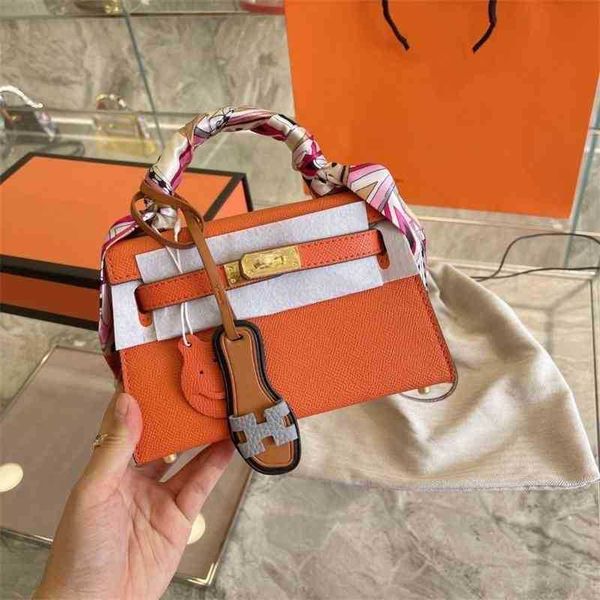 

bags herme kellies handbag kely mini second generation palm grain cowhide presents h small slipper pendant ribbon