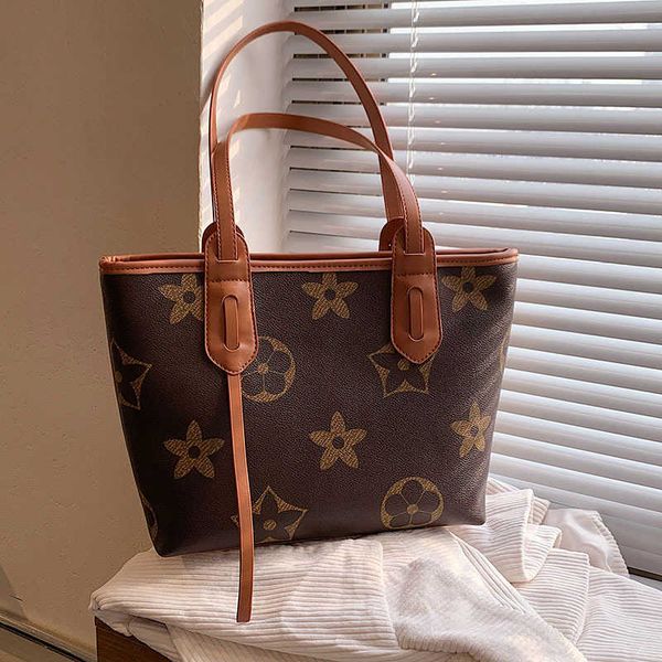 

hand bag evening s large capacity women's 2022 autumn and winter fashion handheld printing shoulder casual armpit tote bag
