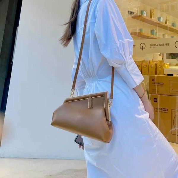 

designer first handbags shoulder messenger clip dinner bag little red book star same dumpling bag female