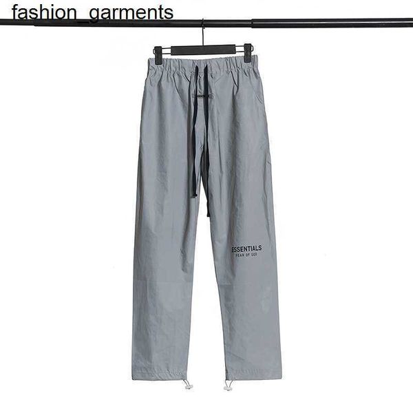 

designer brand essential grey reflective nylon drawstring casual pants, Black