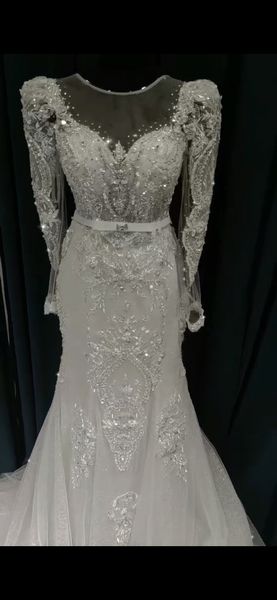 

2023 trail long sleeves mermaid dress beads and pearls decoration luxury elegant wedding dresses super draped and pastels tiers crystal ruff, White