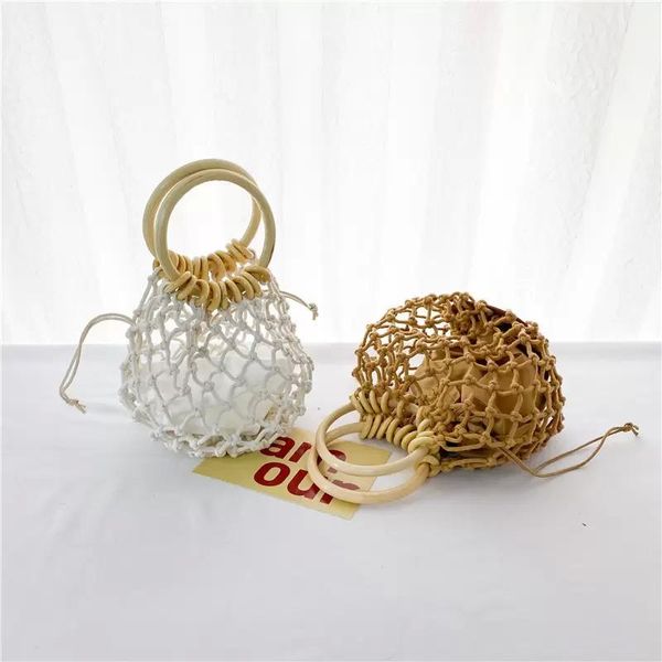 

girls hollow weaving handbags 2022 fashion children drawstring nets bag summer kids beach holiday handbag rre15225