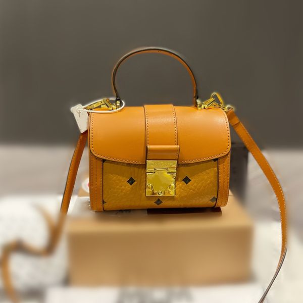 

designer lux cognac color tracy satchel bag soft leather microfiber suede lining laurel leaf lock closed metal tone gold-plated hardware