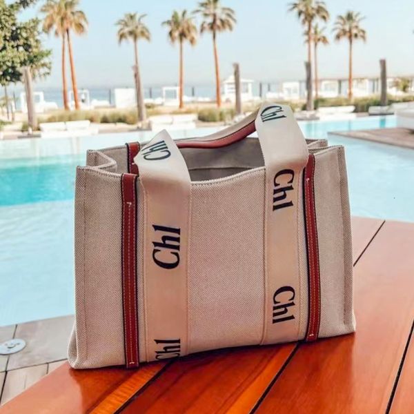 

luxurys designer totes woody beach shopping bag weekend basket womens shoulder bag duffel mens wallet canvas pochette linen crossbody purses