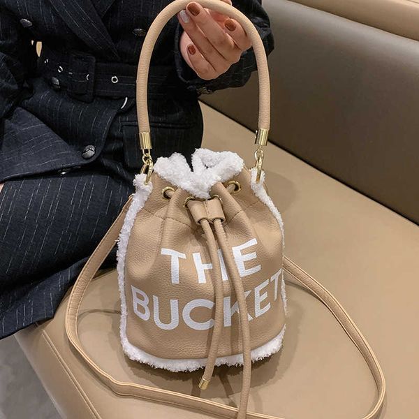 

fall and winter the bucket women handheld bag letter plush fashion texture one shoulder crossbody bag, Red;blue