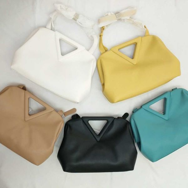 

designer fashion bottess bag venetas big triangle have logo