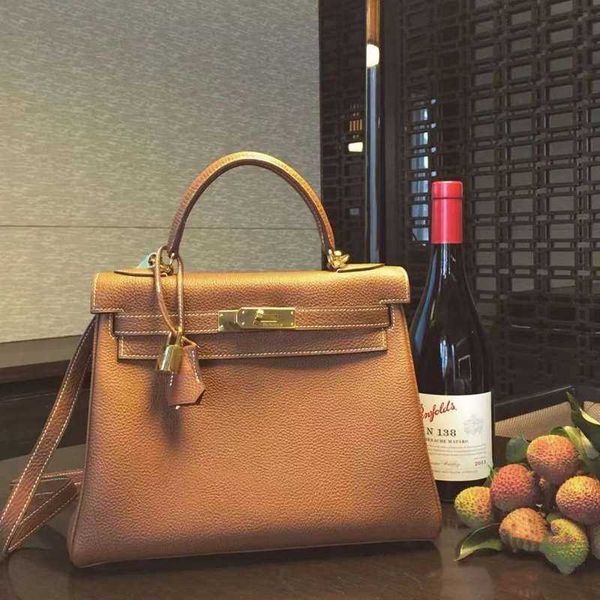 

leather herme platinum bag himalayan kelies litchi pattern togo calfskin 25 28 32 portable one shoulder messenger buckle leather women'