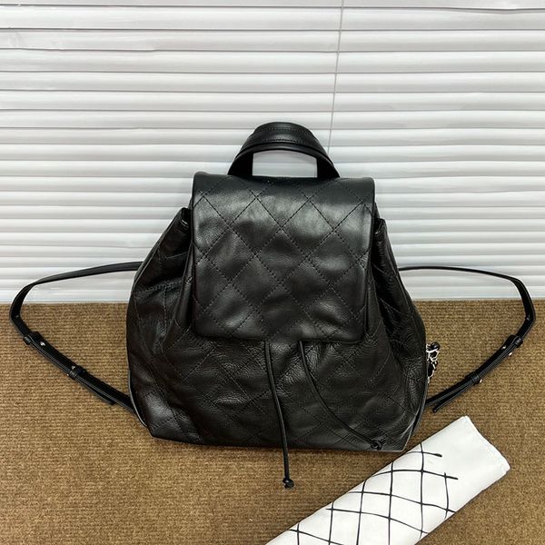 

womens vinatge calfskin black backpack bags drawstring bucket aged silver turn lock adjustable shoulder strap large capacity outdoor travel