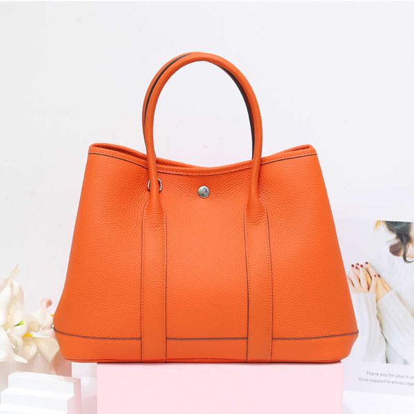 

designer bag women large fashion classic capacity fashionable leather layer cowhide garden tongqin multi-function hand large one shoulder sl