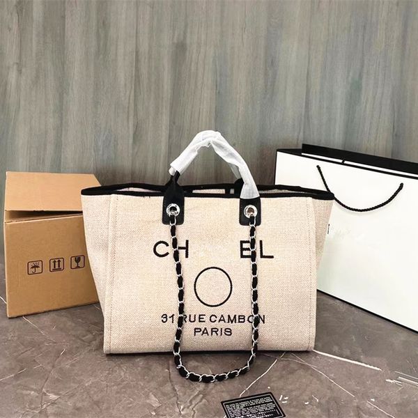 

bag designer handbag shopping luxury set women's and men's canvas shoulder shoulder straddle carrying bracelet fashion large bag