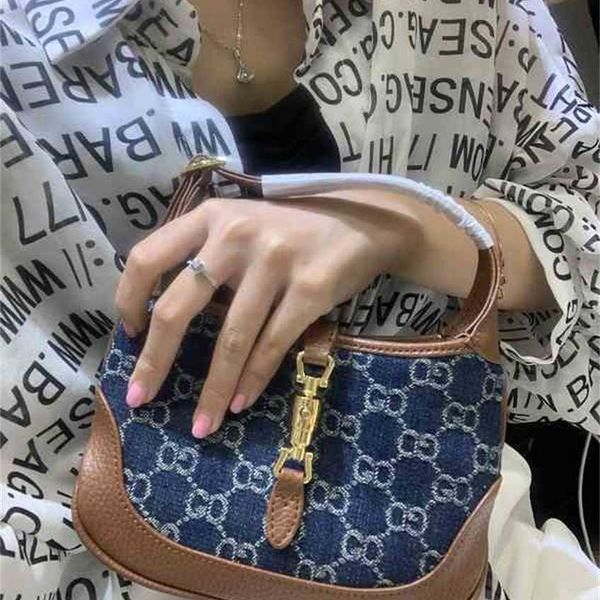 

design 1961 mini horse buckle denim messenger bag leather underarm bag