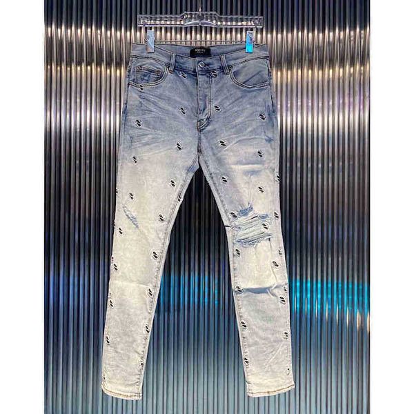 

leg amirly new high street little trendy brand light blue cashew jeans flower embroidery hole slim men