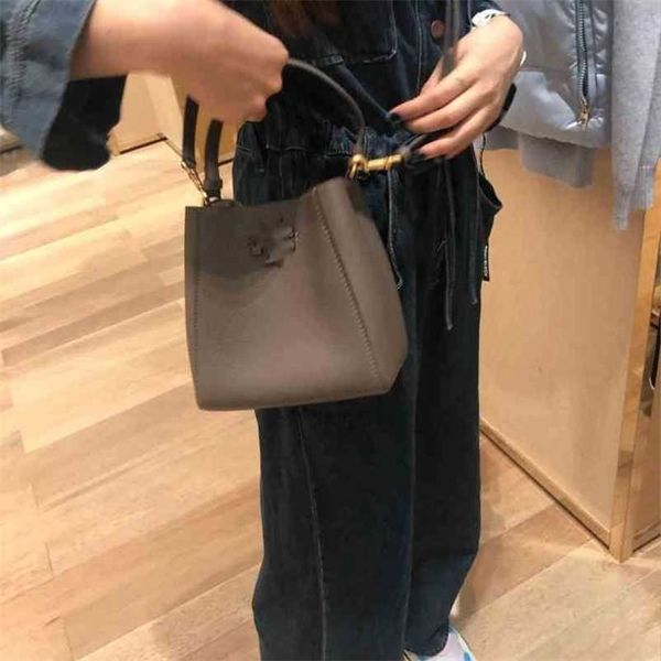 

torys 2022 autumn and burchs winter leather deformed bucket bag large capacity one houlder portable litchi pattern mini women' 2x7g