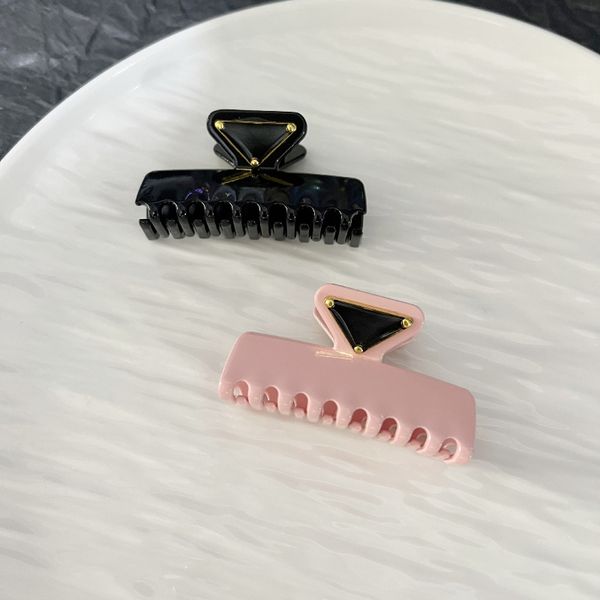 

Designer Hair Clip Alloy Hair Clip Fashionable Women's Hair Accessories Triangular Letters Black and Pink Hair Clip Metal Shark Clip High-quality