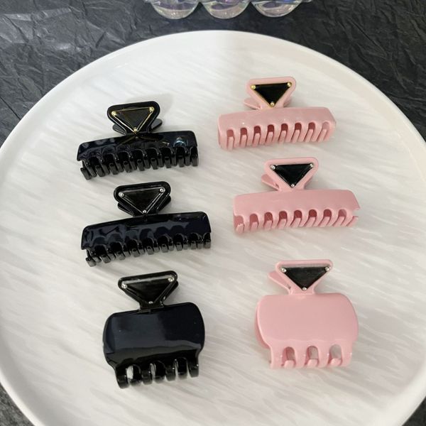 

Alloy Hair Clip Fashionable Women's Hair Accessories Triangular Letters Black and Pink Hair Clip Metal Shark Clip High-quality