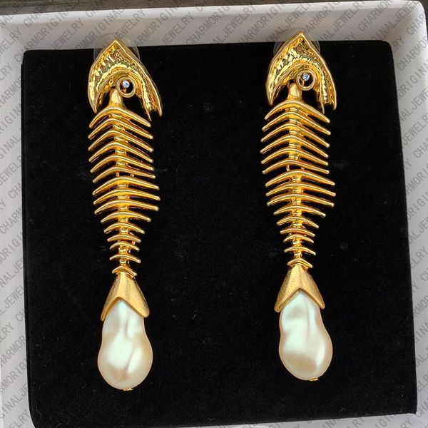 

schiaparelliearrings designer earrings women fishbone pearl drop earrings luxury jewlery designer for women elegant vintage statement timeless gift for her