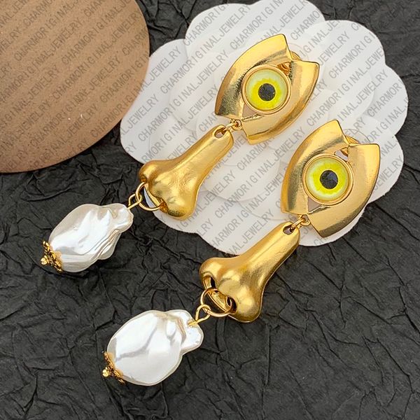 

schiaparelliearrings designer earrings women eyes nose pearl drop earrings luxury jewlery designer for women artistic surreal statement elegant vintage gift