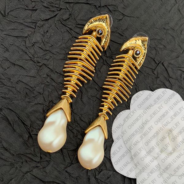 

schiaparelliearrings designer earrings women fishbone pearl drop earrings luxury jewlery designer for women elegant vintage statement timeless gift for her