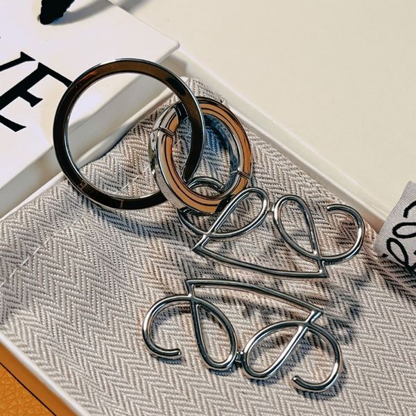 

Keychains for Women and Men Designer Bag Charms Stylish Keychains Classic Patterns Lightweight and Suitable for Daily Use Gold and Silver Colors High Quality, The box