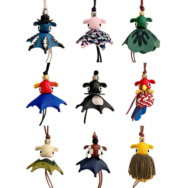 

Designer Leather Bag Pendant Elf Shape Keychain High Quality Cowhide Elf Series Pendant Cute and Interesting Leather Pendant Luxury Accessories, The box