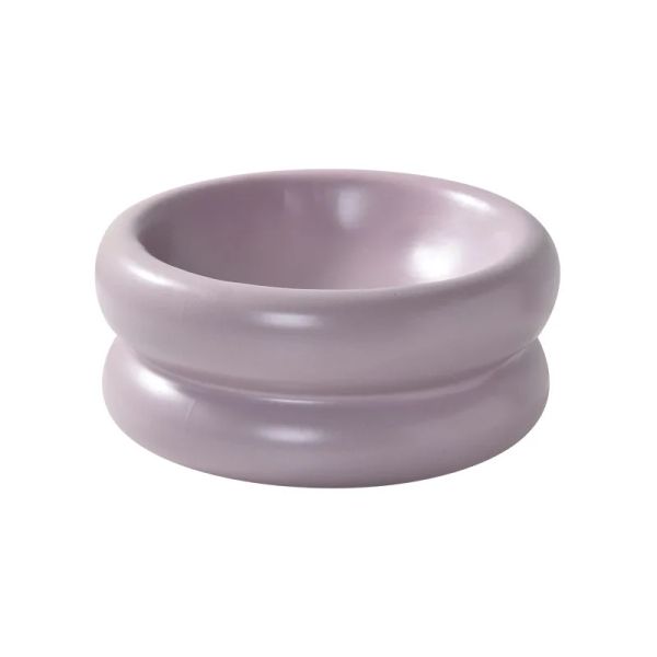 142898 Design a food residue collection trough that surrounds the bottom of the bowl to prevent residue from scattering, making the tabletop cleaner