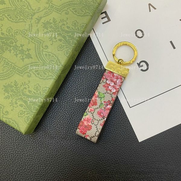 

TOP1 Leather High Quality Keychain Classic Exquisite Designer Car Keyring Alloy Letter Unisex Lanyard Gold Black Metal Jewelry With Box Gift Car Accessories