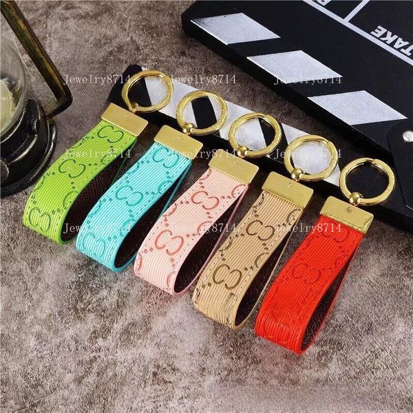 

Classic luxury keychain bag charm designer key chain for men alloy metal parts letter cowhide leather black pink cute canvas key buckle wallet accessories