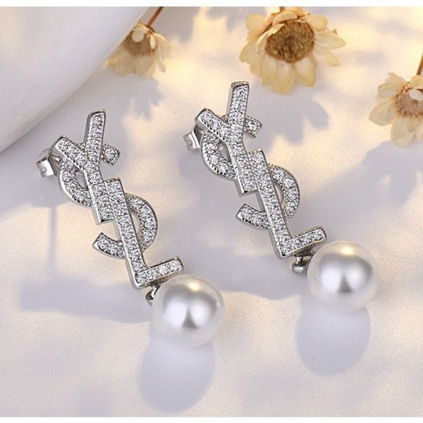 

Chic S925 Sterling Silver & Gold-Toned Small Bow Pearls for Simple Female Ear Jewelry