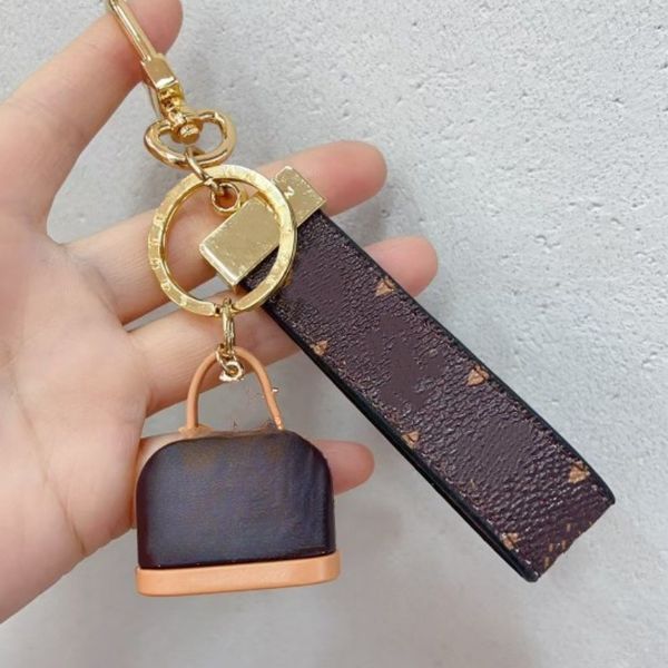 

Keychains Buckle lovers Car Handmade Leather Keychains Men and Women bag Pendant Fashion Accessories Mini Handbags Charms Designer Leather Car Keyring Chain