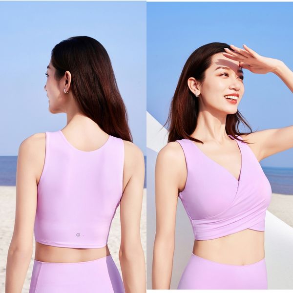 A1127 Yoga Wear Is A Versatile And Slimming Top For Both Sporty And Casual Commuting It Features A One-Piece Cup With A Chest Pad And A Cross-Shaped Fashionable Vest